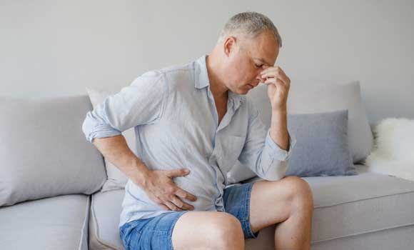 What causes constipation and what can be the consequences